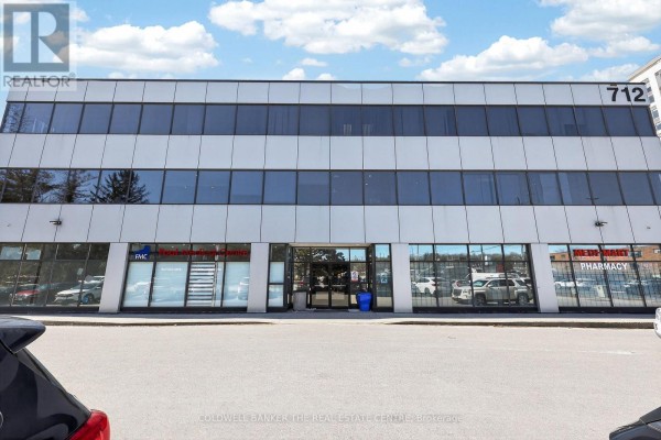 309 - 712 Davis Drive, Newmarket, ON L3Y8C3 Photo 4