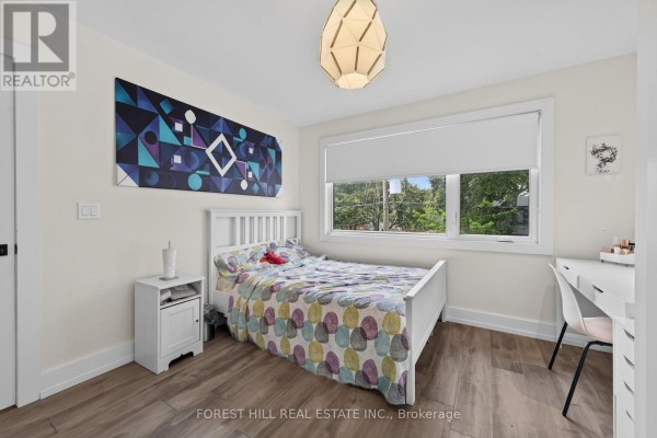 Built-in closets and a mirror in a hallway - 309 Wychwood Avenue Toronto