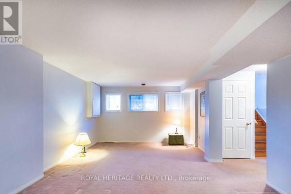 Finished basement with wood stove and utility access - 31 Thames Drive N Whitby