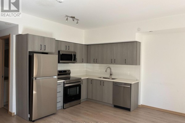 Living room - 310 - 3425 Sheppard Avenue E, Toronto, ON M1T3K5 Photo 2