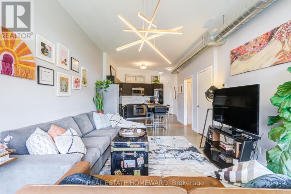 Living room - 310 - 549 King Street E, Toronto, ON M5A1M5 Photo 4