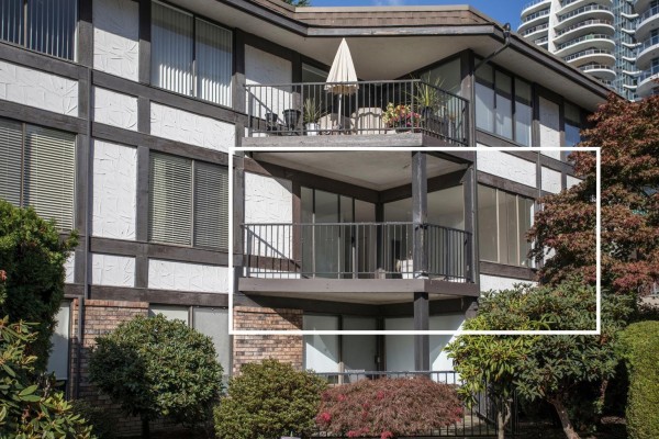 Balcony of the apartment unit, surrounded by trees and shrubs. - 310 1437 Foster Street, White Rock