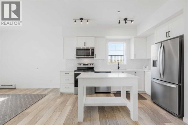 Living room - 3104, 3727 Sage Hill Drive Nw, Calgary, AB T3R1T7 Photo 2
