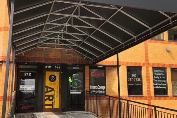 Entrance to commercial units 211, 311, and 312, with glass doors and signage. - 311 - 9011 Leslie Street, Richmond Hill