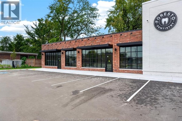 Interior view of unfinished commercial space with exposed metal beams and insulation. - 3113 Dougall Unit# 1, Windsor