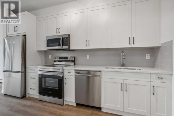 Kitchen - 3117, 1802 Mahogany Boulevard Se, Calgary, AB T3M4A5 Photo 3