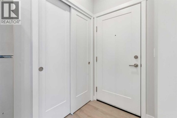 Living room - 312, 655 Shawnee Square Sw, Calgary, AB T2Y1E3 Photo 2