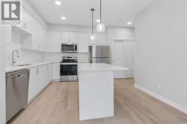 Laundry room - 312, 655 Shawnee Square Sw, Calgary, AB T2Y1E3 Photo 4