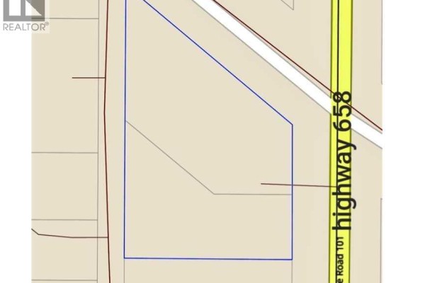 Aerial view showing a parcel of land outlined in blue, adjacent to Highway 658. - 312 3rd Street, Blue Ridge