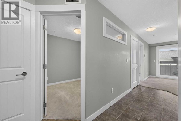 Bedroom - 313, 130 Auburn Meadows View Se, Calgary, AB T3M2P3 Photo 4