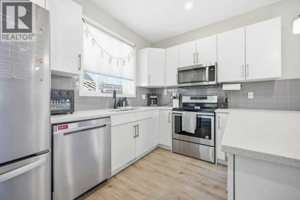 Kitchen - 313 Seton Circle Se, Calgary, AB T3M2V8 Photo 2