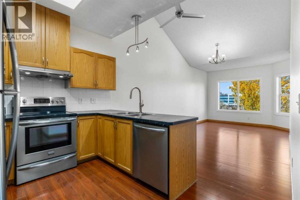 Kitchen - 314, 1920 14 Avenue Ne, Calgary, AB T2E8V4 Photo 2