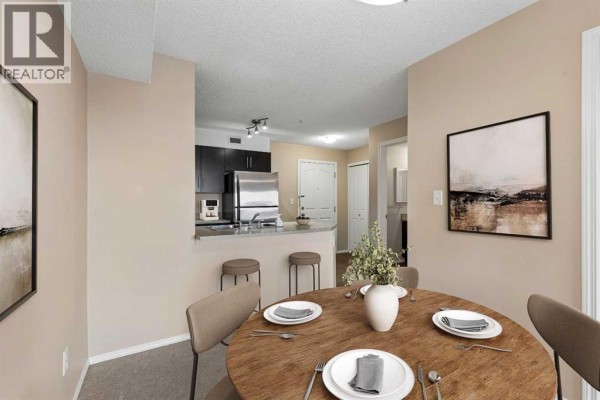 Living room - 314, 7210 80 Avenue Ne, Calgary, AB T3J0N7 Photo 3