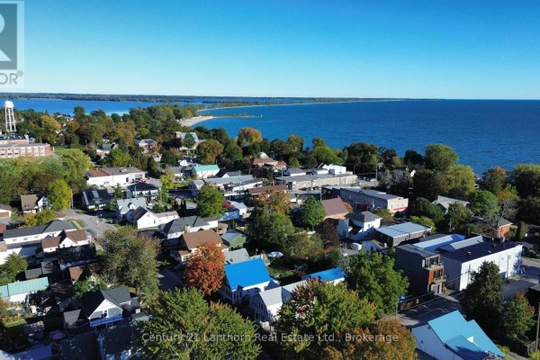 Aerial view of a Prince Edward County town with waterfront and blue sky. - 314 Second Avenue, Prince Edward County