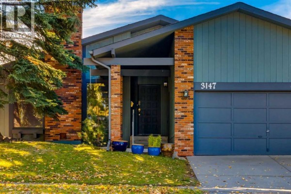 Living room - 3147 Palliser Drive Sw, Calgary, AB T2V4G7 Photo 2