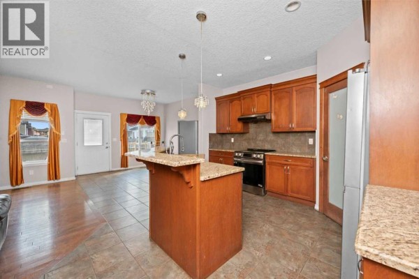 Living room - 316 Saddlemont Boulevard Ne, Calgary, AB T3J0M9 Photo 5