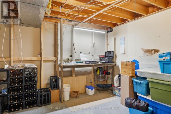 Workbench with tools, storage shelves and bins in a basement - 3160 Dunning Road Ottawa