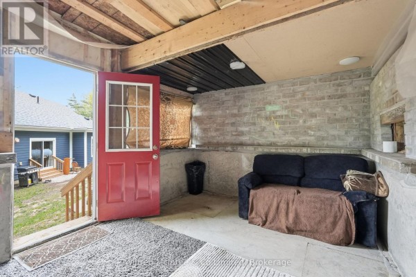 Outdoor space with red door and sofa - 316040 6 Highway Chatsworth