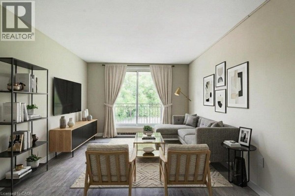 Living room with a sectional sofa, coffee table, television, chairs, and balcony view. - 317 Erb Street W Unit# 3, Waterloo