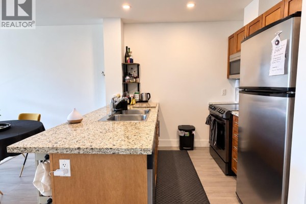 318 1211 Village Green Way, Squamish, BC V8B0R7 Photo 2