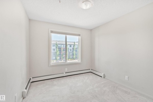 Primary Bedroom - #318 5521 7 Av Sw Sw, Edmonton, AB T6X2A8 Photo 4