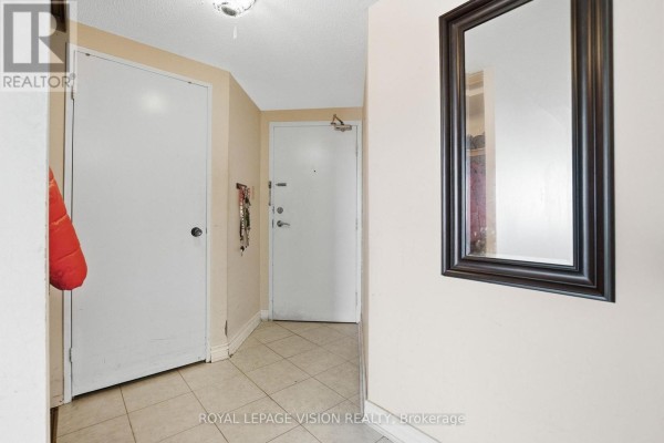 Primary Bedroom - 319 - 10 Dean Park Road, Toronto, ON M1B3G8 Photo 4