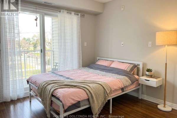 Primary Bedroom - 319 - 5235 Finch Avenue E, Toronto, ON M1S5X3 Photo 5