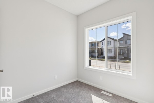 Bedroom 2 - 319 Edgemont Dr Nw, Edmonton, AB T6M3G7 Photo 4