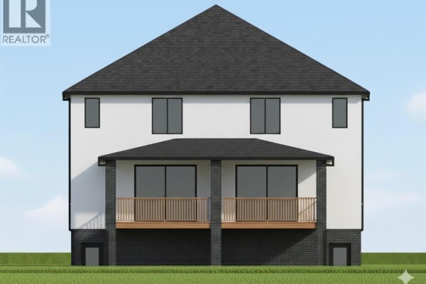Rear view of a white duplex with a black roof, showing two balconies and dark brick foundation. - 3191 Mcrobbie Road, Windsor