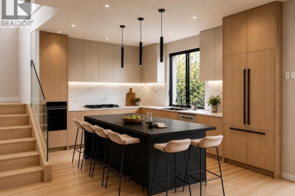 Contemporary kitchen with light wood cabinets, black island, marble backsplash, stainless steel appliances, and pendant lights. - 3194 W 18th Avenue, Vancouver