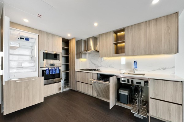 Kitchen with refrigerator, oven, dishwasher, and cabinets open, showing storage. - 31xx 13778 100 Avenue, Surrey