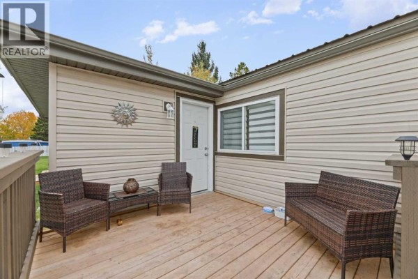 Living room/Dining room - 32, 1190 15 Avenue, Didsbury, AB T0M0W0 Photo 2