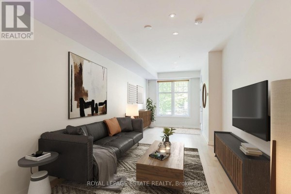 Living room - 32 - 140 Broadview Avenue, Toronto, ON M4M0A8 Photo 2