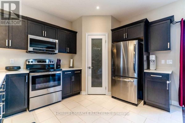 32 Carleton Trail, New Tecumseth, ON L0G1A0 Photo 5