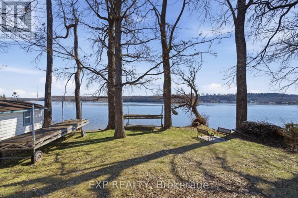 Waterfront yard with dock and boat shed - 32 Quinte View Road Greater Napanee