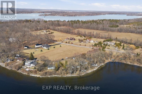 Waterfront property with multiple houses and treed lot - 32 Quinte View Road Greater Napanee