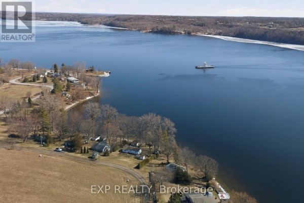 Waterfront property with ferry and small buildings - 32 Quinte View Road Greater Napanee