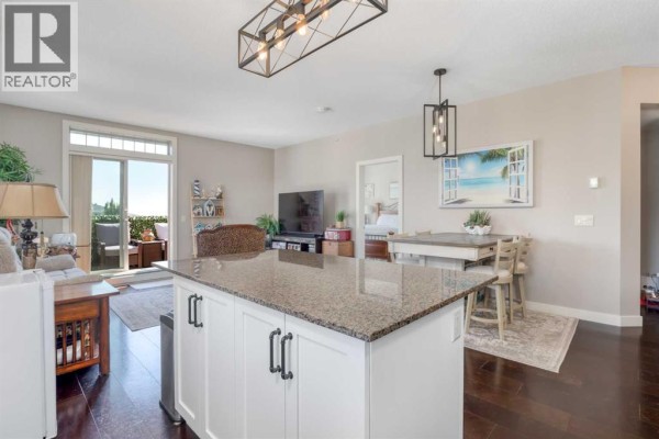 Kitchen - 320, 205 Sunset Drive, Cochrane, AB T4C0H6 Photo 4