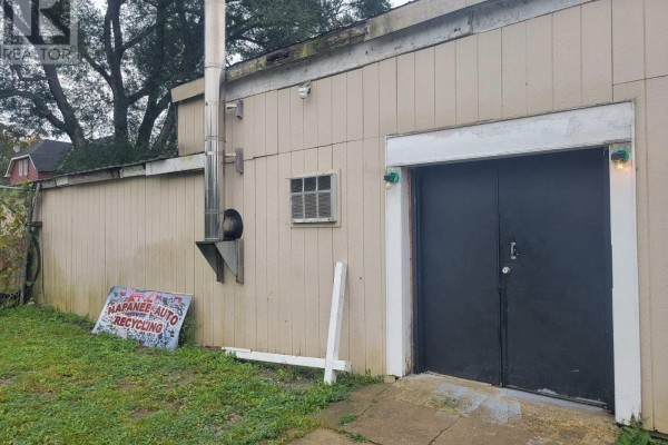 Close-up of large double doors on the side of a commercial building. - 3201 County Road 41, Greater Napanee