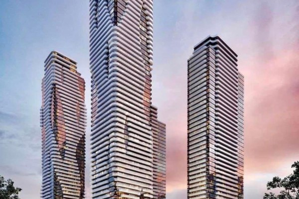 Exterior view of three modern high-rise apartment buildings at dusk with pink sky. - 3208 - 195 Commerce Street, Vaughan