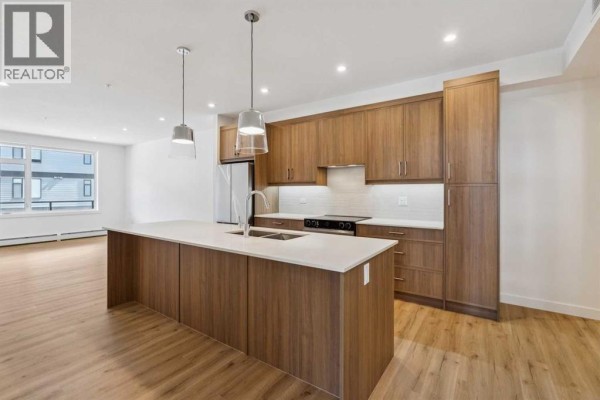 Kitchen - 3209, 3700 Seton Avenue Se, Calgary, AB T3M4J1 Photo 3