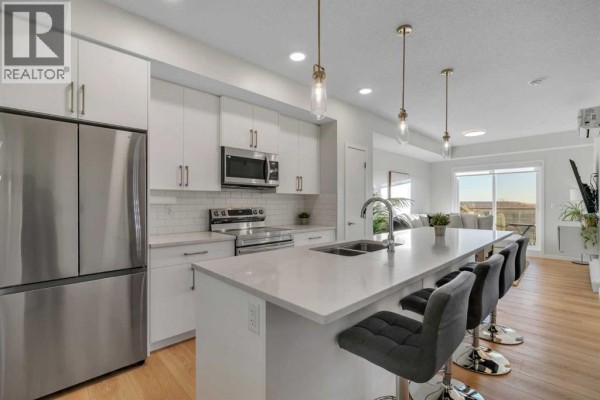 Living room - 3211, 550 Belmont Street Sw, Calgary, AB T2X5Y9 Photo 2