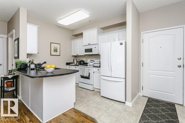 Primary Bedroom - #323 16807 100 Av Nw, Edmonton, AB T5P4Z6 Photo 5