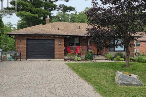 Close-up of the wood front door with glass panels and address number 324. - 324 Bethune Drive N, Gravenhurst)