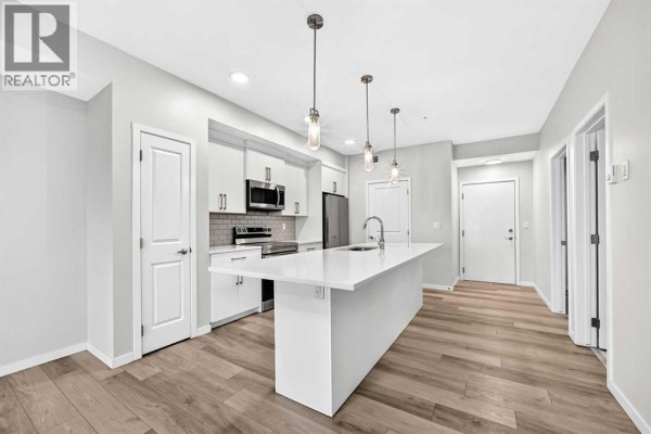 Primary Bedroom - 325, 360 Harvest Hills Way Ne, Calgary, AB T3K2S1 Photo 2