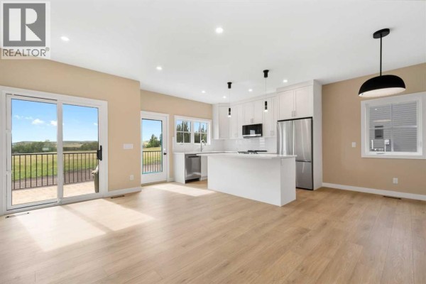Dining room - 325 Flare Avenue Sw, Diamond Valley, AB T0L2A0 Photo 4