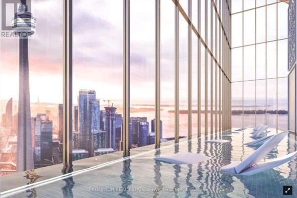 Two small outdoor plunge pools with modern wooden wall panels and accent lighting. - 326 - 3 Concord Cityplace Way, Toronto