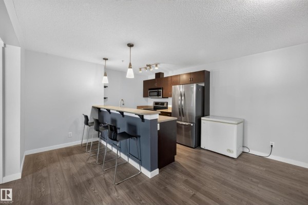 Primary Bedroom - #326 1180 Hyndman Rd Nw, Edmonton, AB T5A0P8 Photo 4