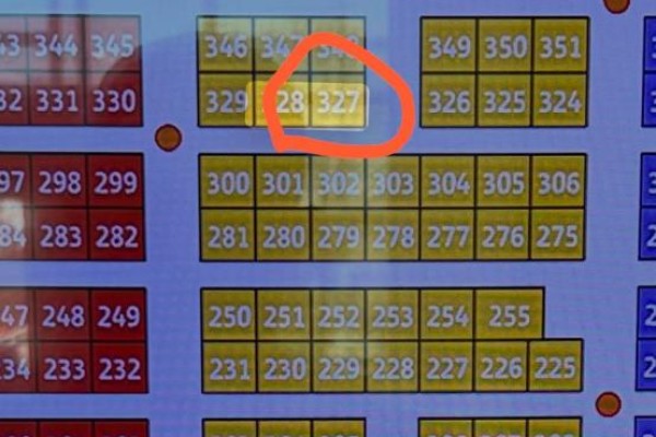 Close-up of a digital directory board showing unit numbers, with unit 327 highlighted. - 327 - 7250 Keele Street, Vaughan