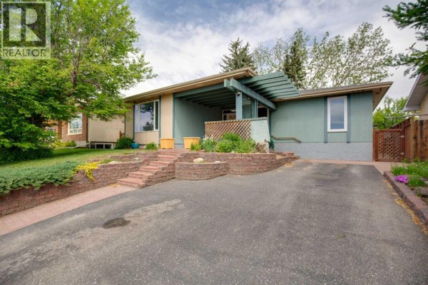 Sunroom - 328 Norseman Road Nw, Calgary, AB T2K5M5 Photo 3
